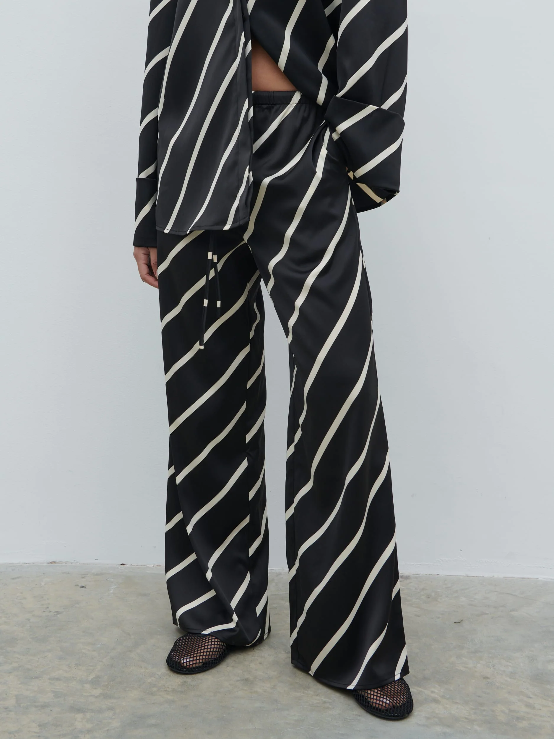 Bobbi Drawstring Trousers - Black Asymmetric Stripe - Image 2